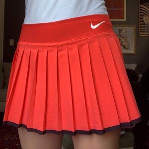 Pleated red Nike tennis skirt